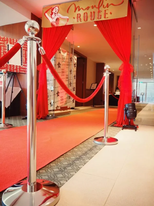 red rope and silver bollard