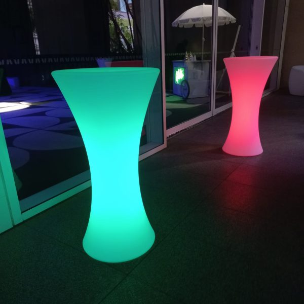 glowing cocktail tables at an evening event